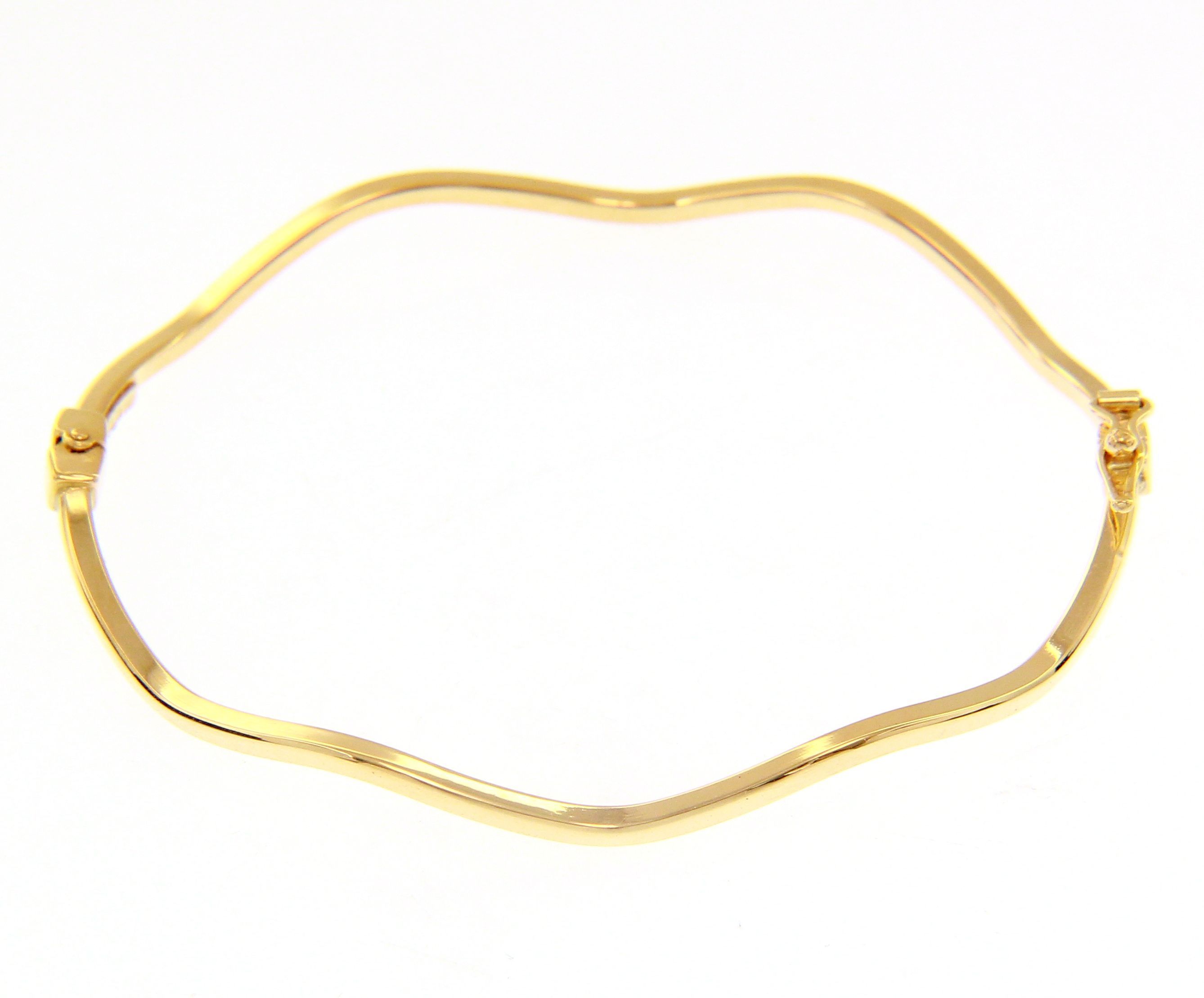 Bracciale rigido ondulato in oro giallo k14 (code S233135)